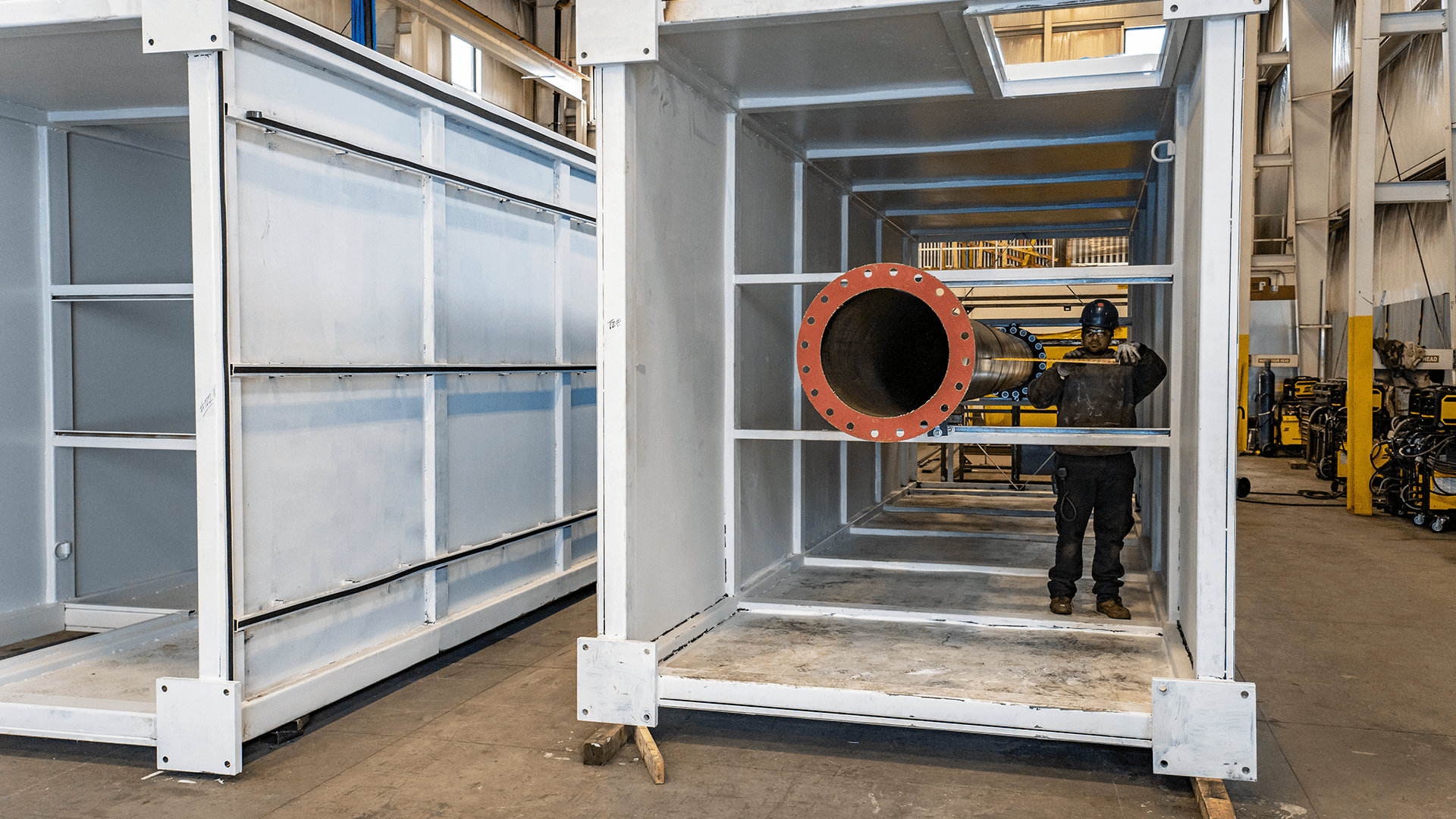 worker assembling plenum exhaust Acoustical Sheetmetal Company