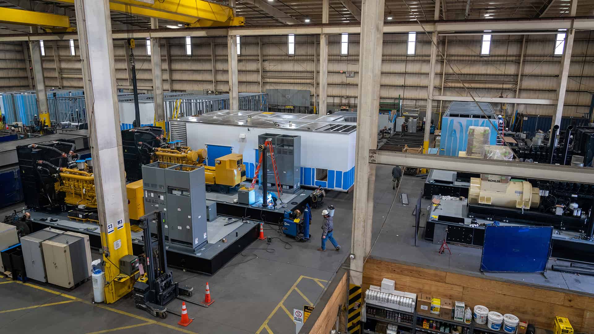 interior wide shot of Acoustical Sheetmetal Company Production Road manufacturing facility
